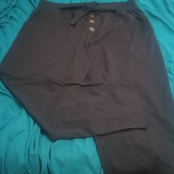 Black stretch belted pants. - Picture 3 of 5